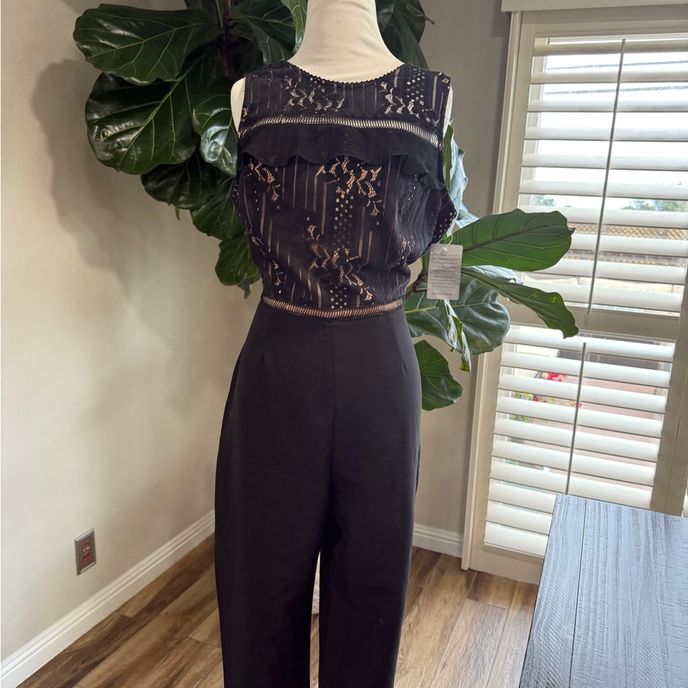 Adelyn Rae Black Jumpsuit with Shimmery Top and Slim Silhouette
